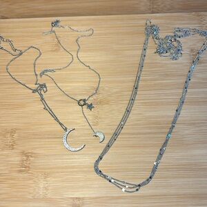 Bundle of 3 silver tone necklaces.